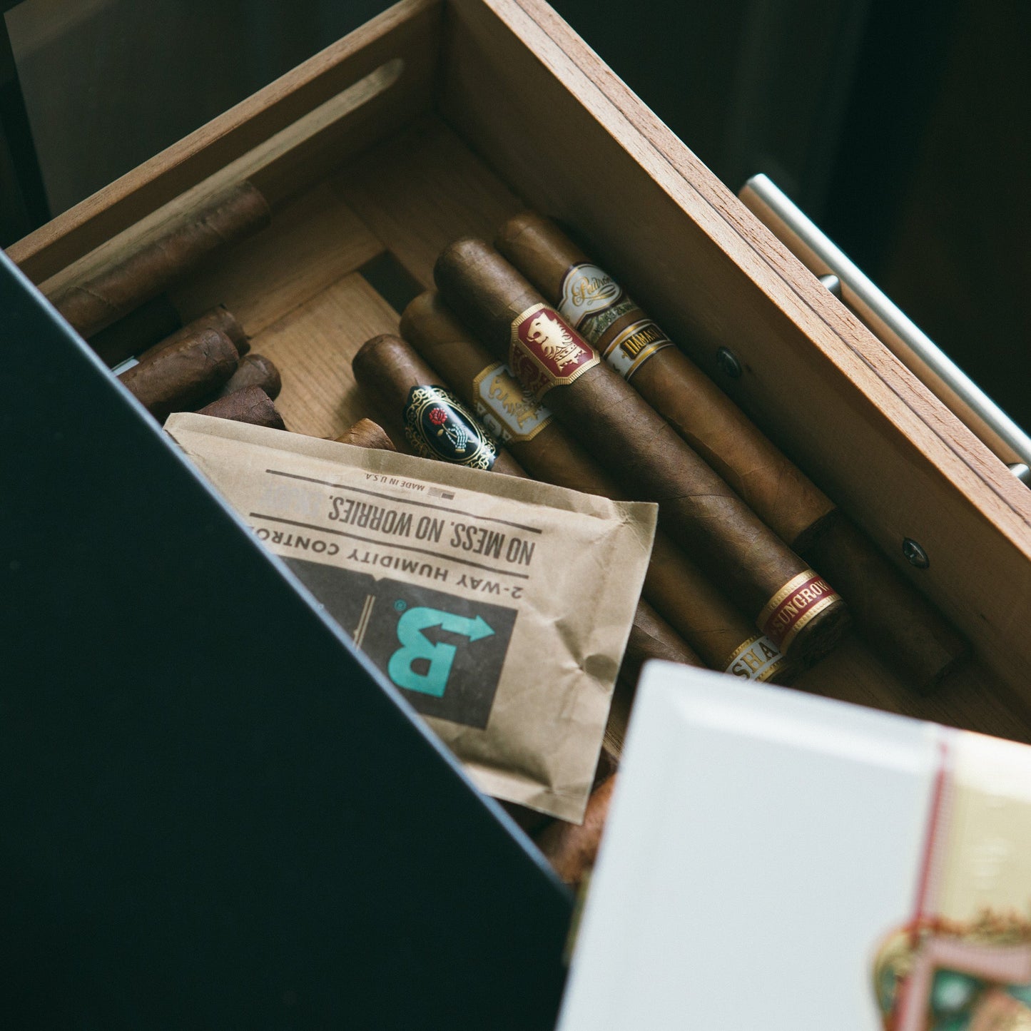 Boveda 69% RH pack with cigars in humidor