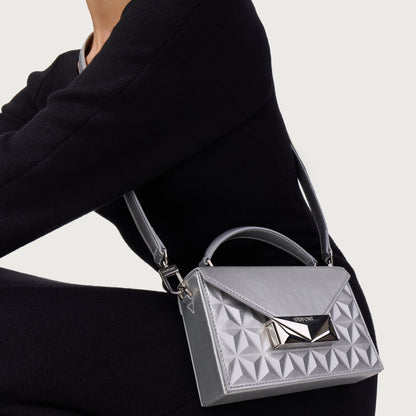 S.T. Dupont Bag Mini Trunk Silver — angle view
