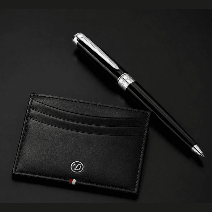 S.T. Dupont holiday set SET-ME-01 - black D-Line leather credit card holder beside a Line D Eternity large ballpoint pen