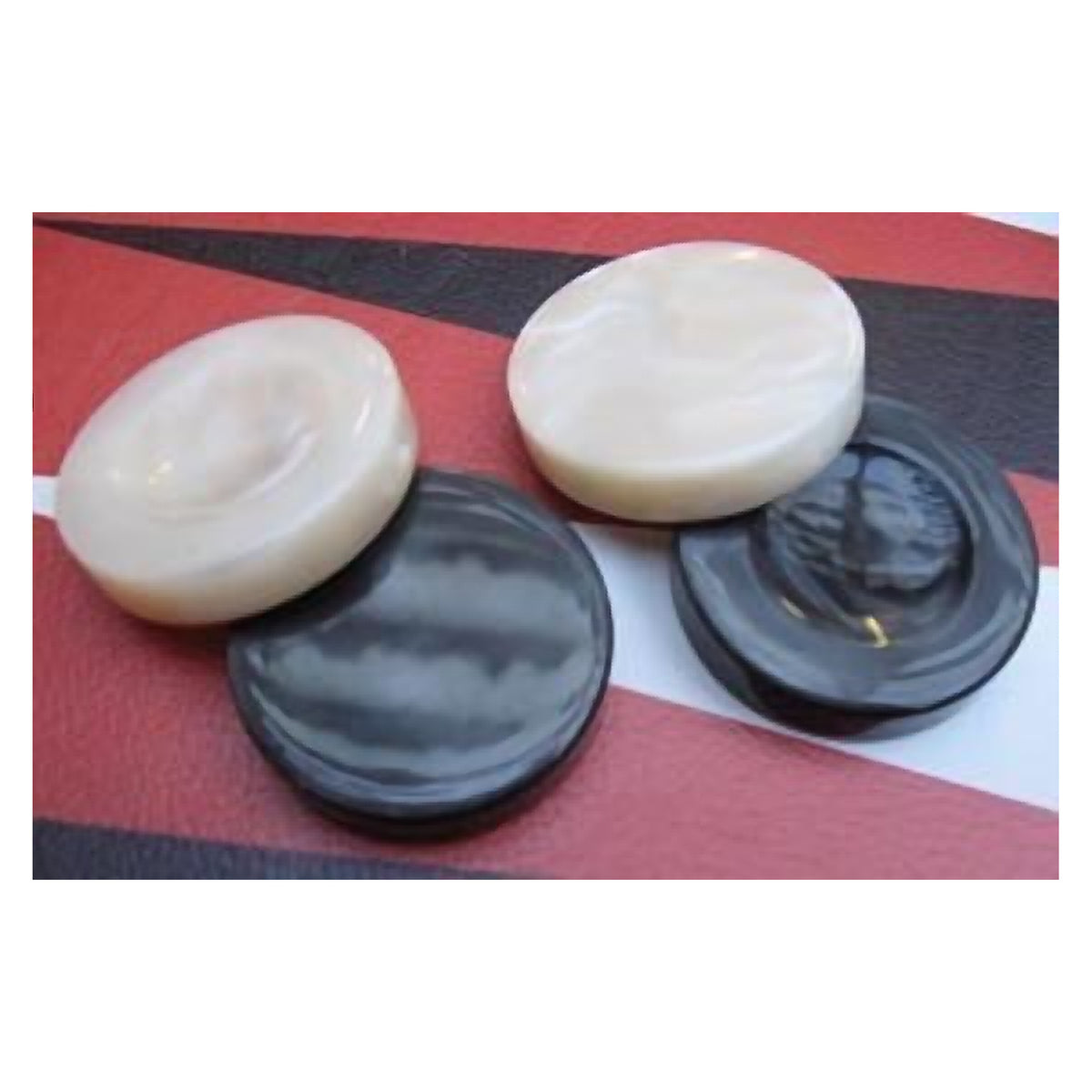 Geoffrey Parker pearlised acrylic backgammon stones in white and black – detail
