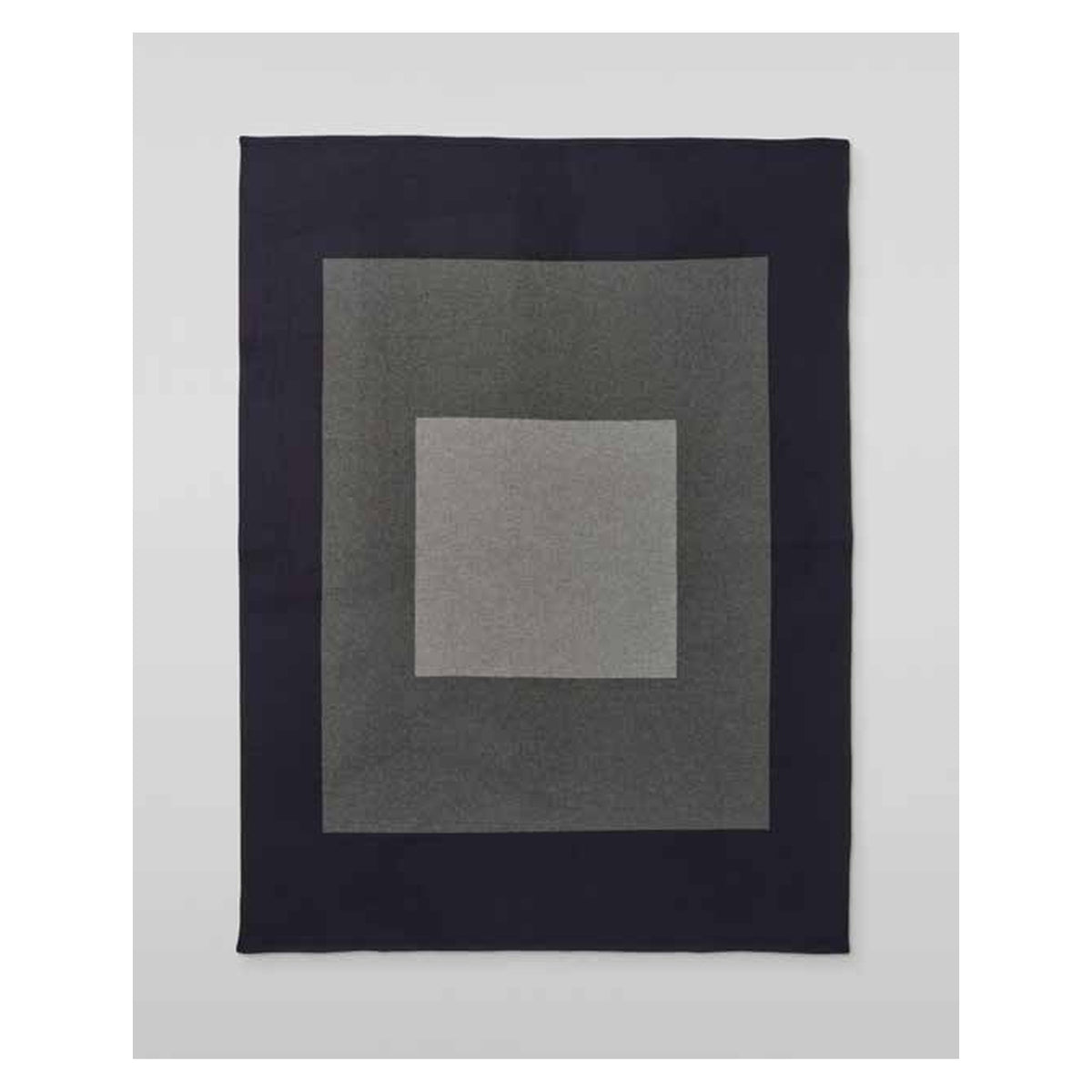 Johnstons of Elgin Art Geometric Throw in Navy / Grey — laid flat